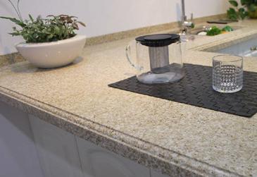 石英石台面好不好,人造石英石台面优缺点全面解析耐用性、美观度与维护成本